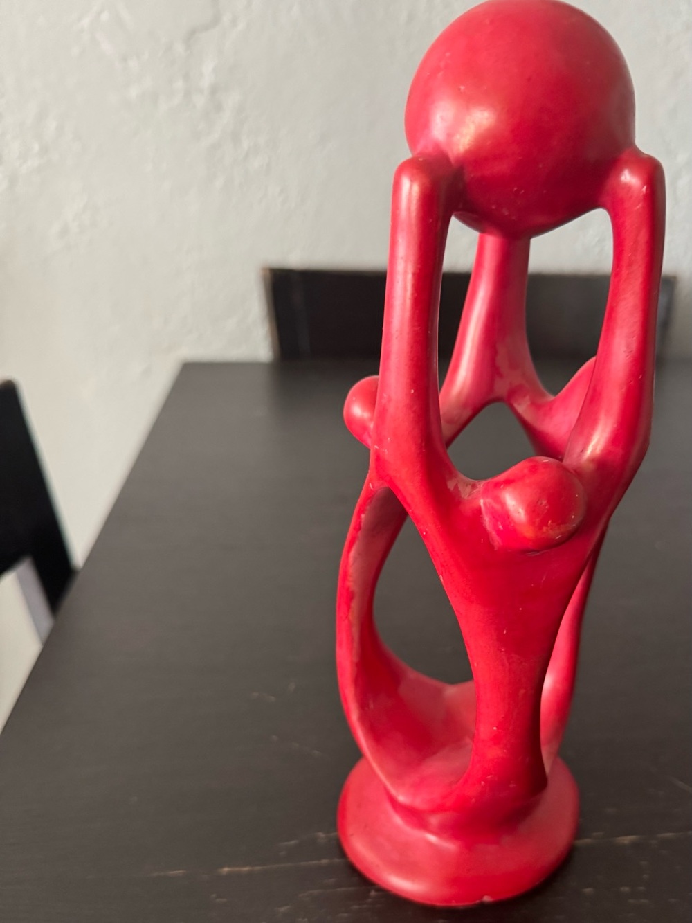 Red hand-carved red soapstone abstract sculpture from Kenya